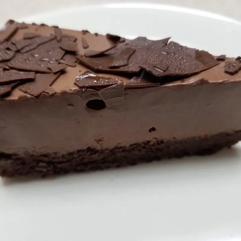 A slice of chocolate mousse cake